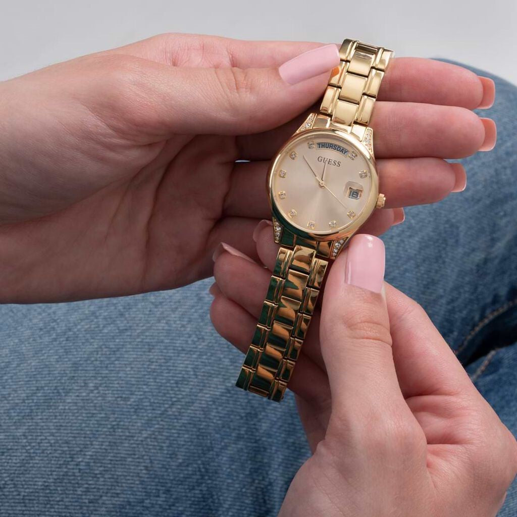 Orologio donna in acciaio dorato Guess con pietre luminose con giorno e datario