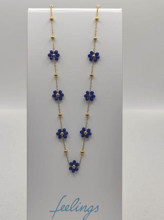 Collana fiori margherite con perline blu base acciaio dorato anallergico
