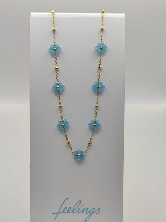 Collana fiori margherite con perline azzurre base acciaio dorato anallergico