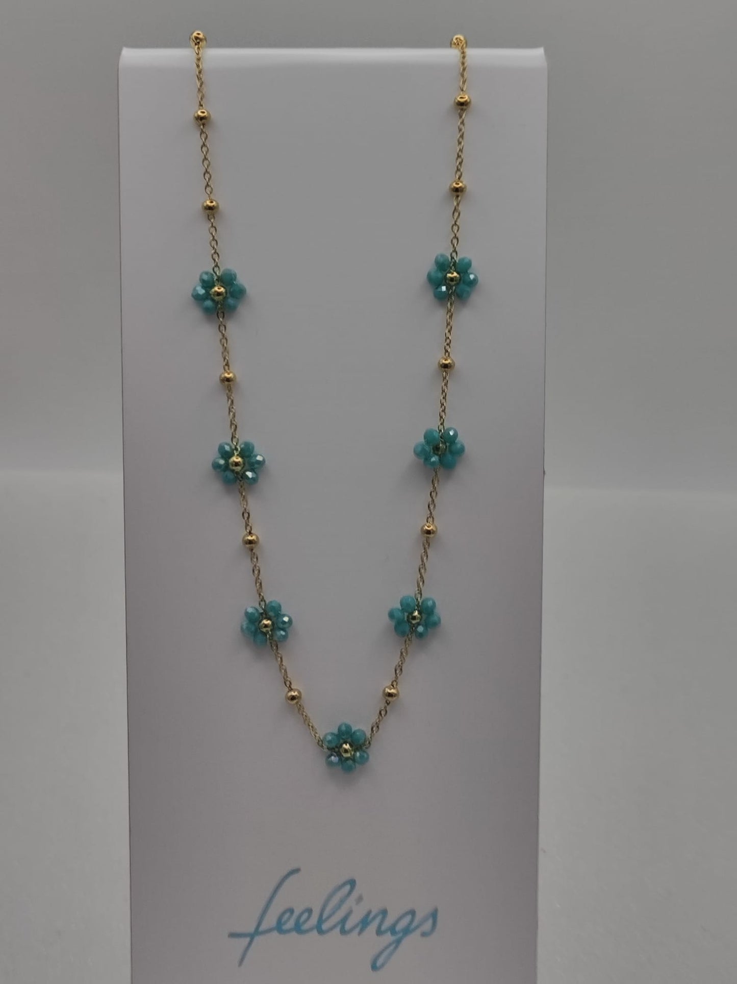Collana fiori margherite con perline verde acqua marina base acciaio dorato anallergico