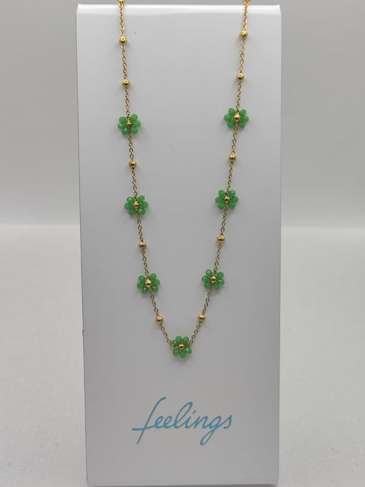 Collana fiori margherite con perline verdi base acciaio dorato anallergico