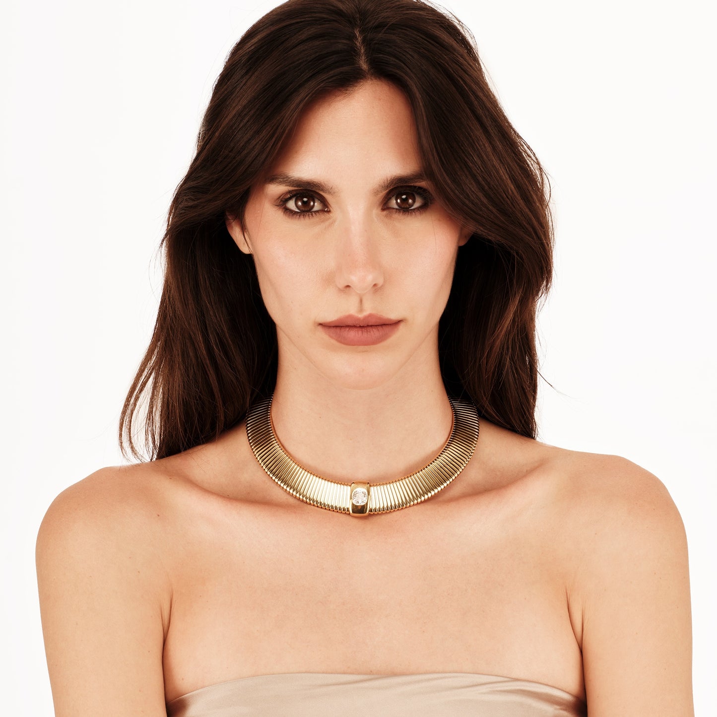 Collana rigida color oro in acciaio anallergico con punto luce al centro BREIL